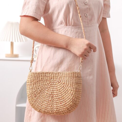 Woven bag in beige colour and detachable strap